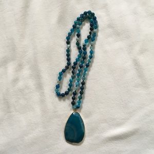 Blue pendant necklace with 8mm beads.